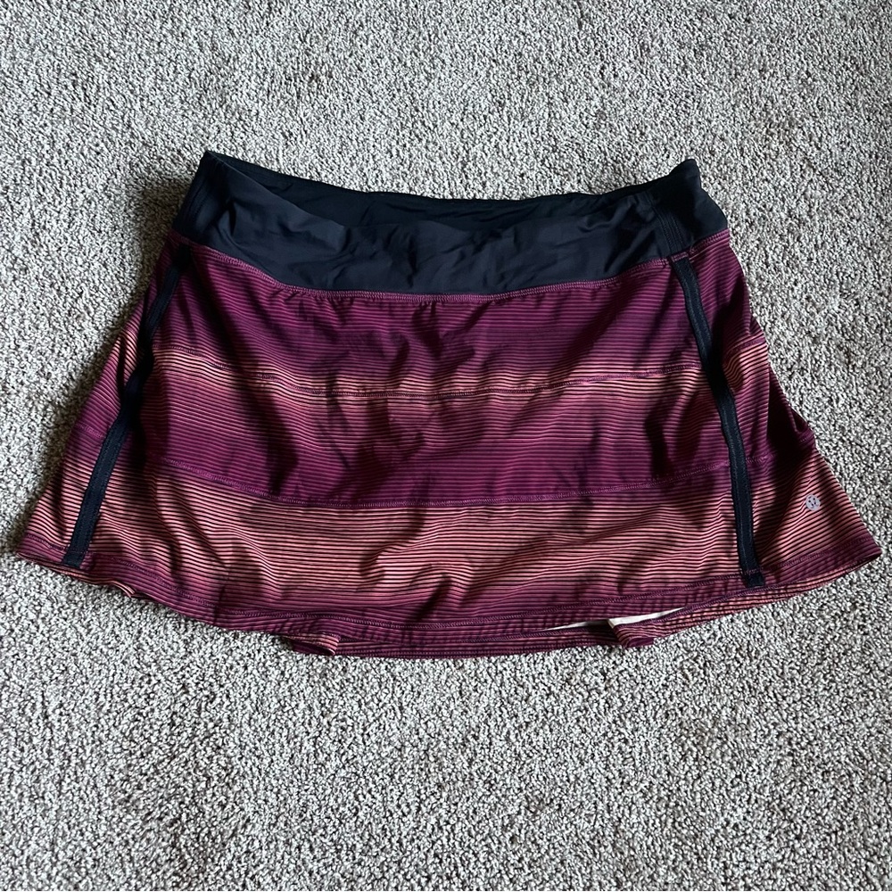 Lululemon Pace Rival Skirt II (12 Tall)
Simply Radiant Pink Paradise Black